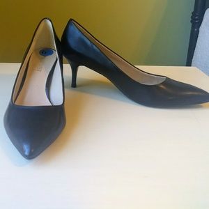 Black leather kitten heel pumps, size 6.5